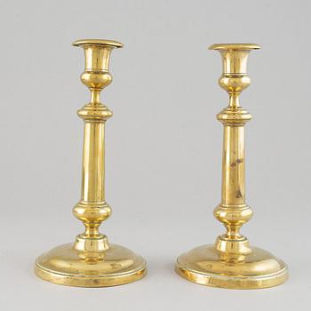 A pair of bronze Rmpire candlesticks, first half of he 19th century.