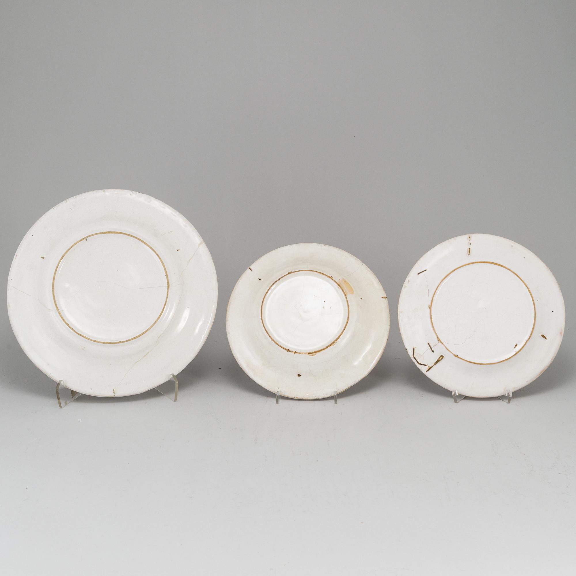 A Swedish faience serving dish and six plates, 18th Century.