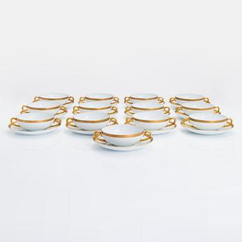 A 13-piece set of Arabia porcelain broth bowls with saucers, 1932-49.