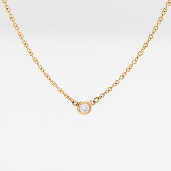 Tiffany & Co, Elsa Peretti, an 18K gold necklace with a ca. 0.05 ct diamond.