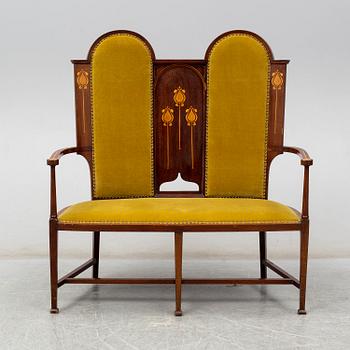 An Art Nouveau sofa, circa 1900.