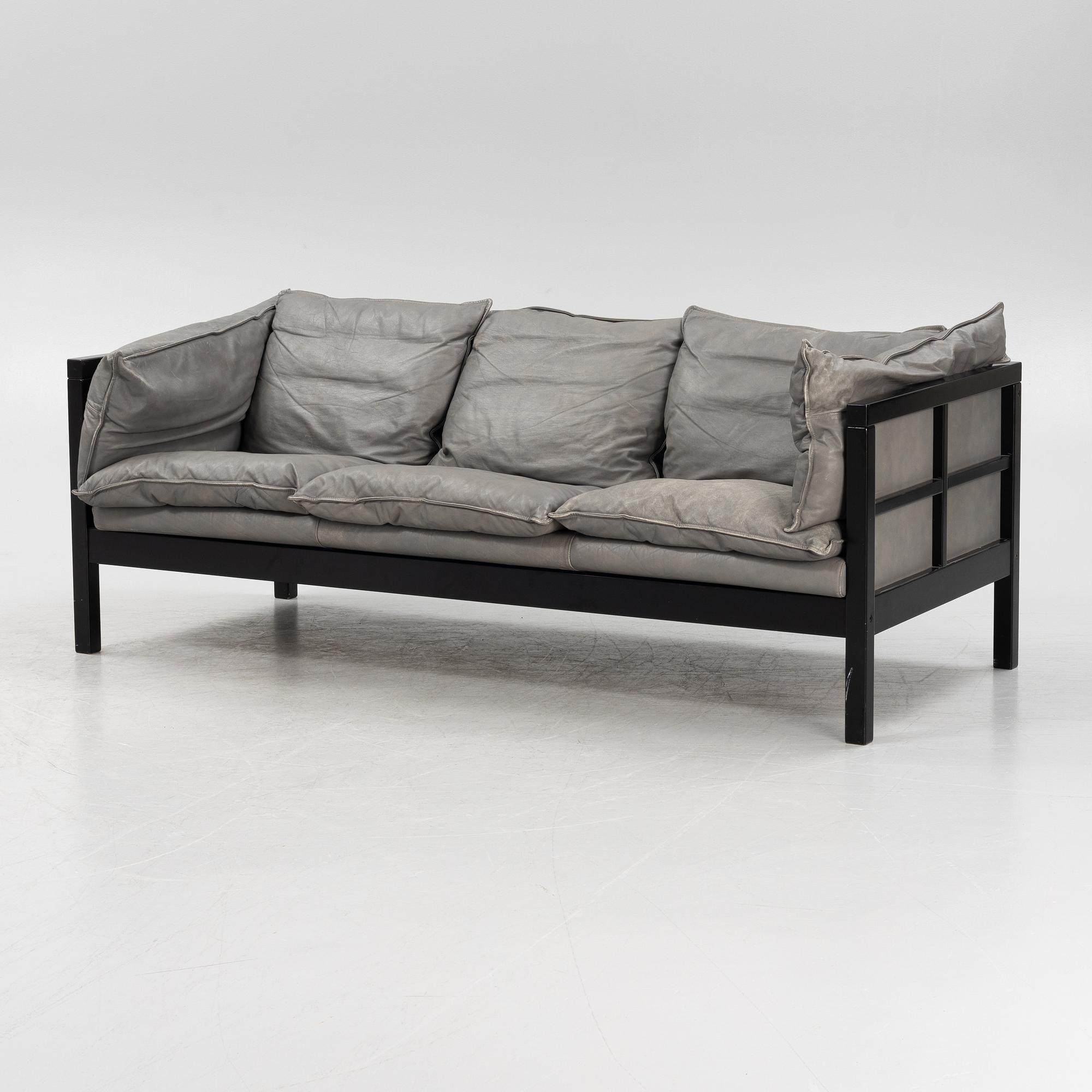 A lether sofa, later part of the 20th Century.