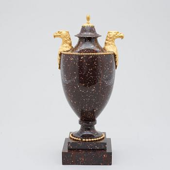 A Swedish late Gustavian 19th Century porphyry and gilt bronze urn.