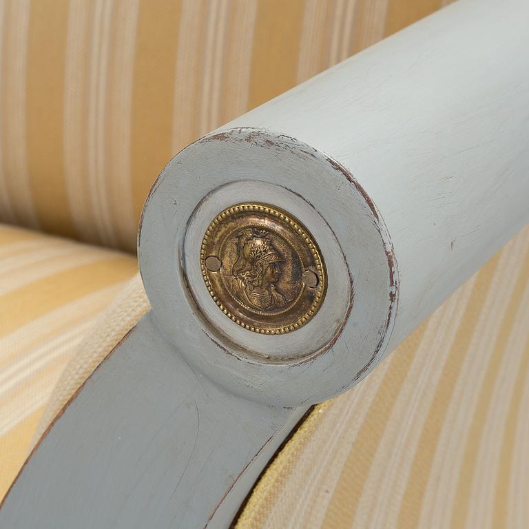 A mid 19th century painted sofa.