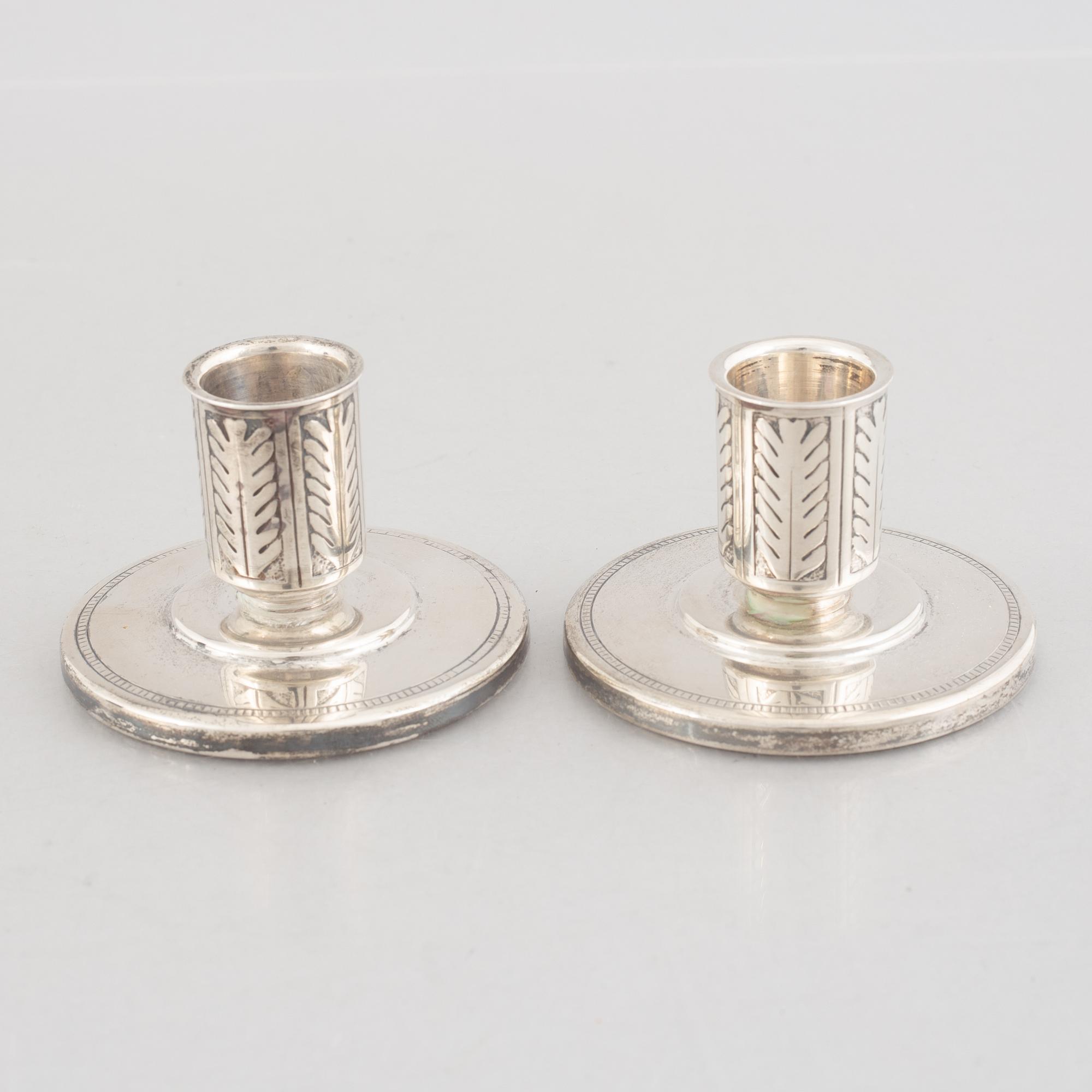 A pair of silver candlesticks, marks of W.A. Bolin, Stockholm, Sweden 1941.