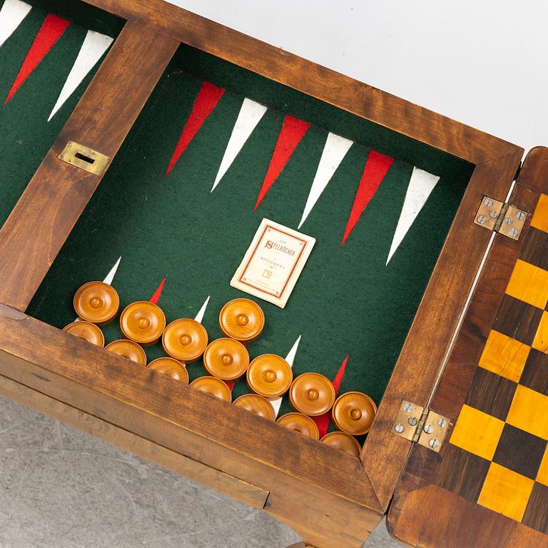 A Rococo card table, second half of the 18th Century.