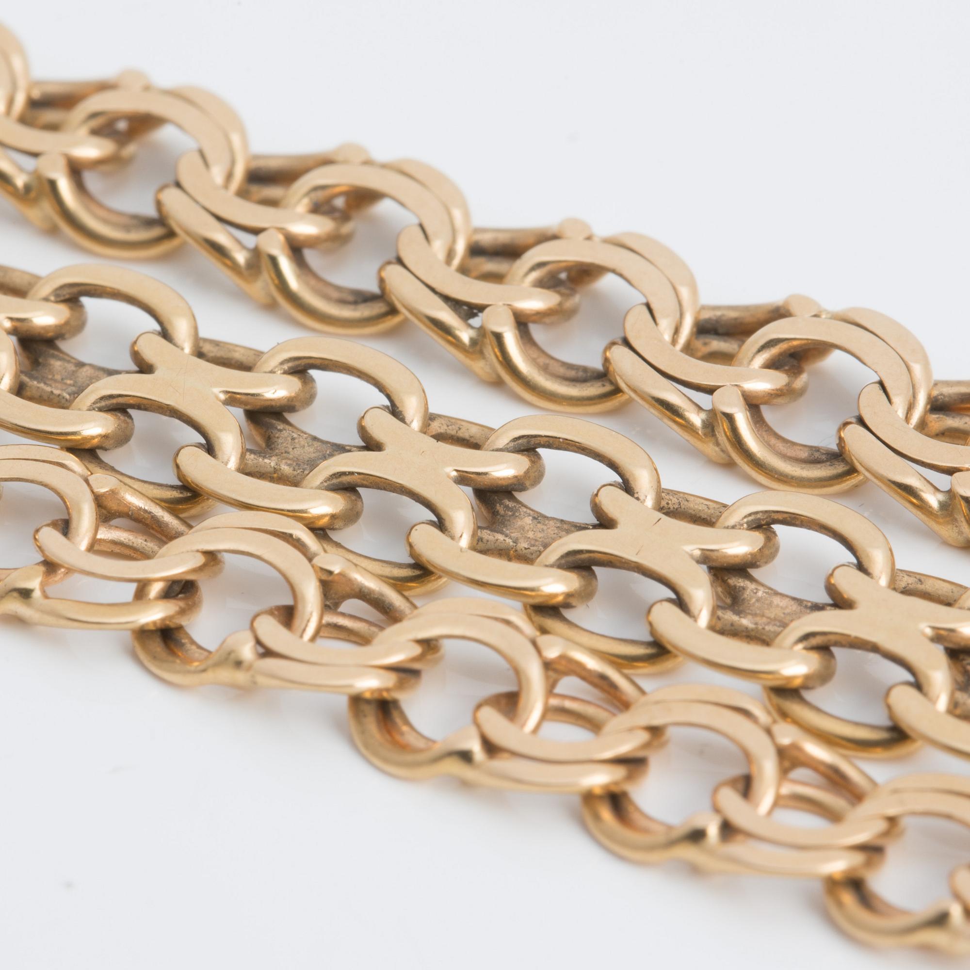 ARMBAND, x-länk samt bismarck, 18K guld.