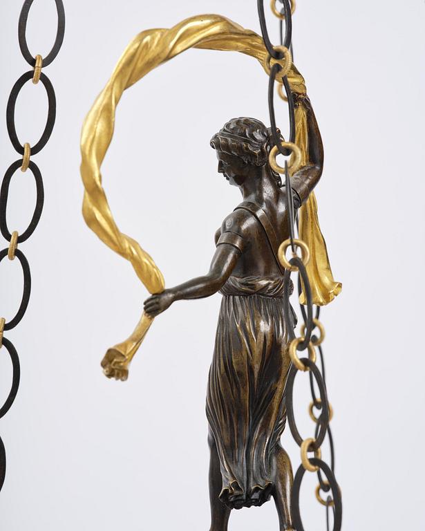 A patinated and ormolu six-light Empire chandelier, Stockholm, first part 19th century.