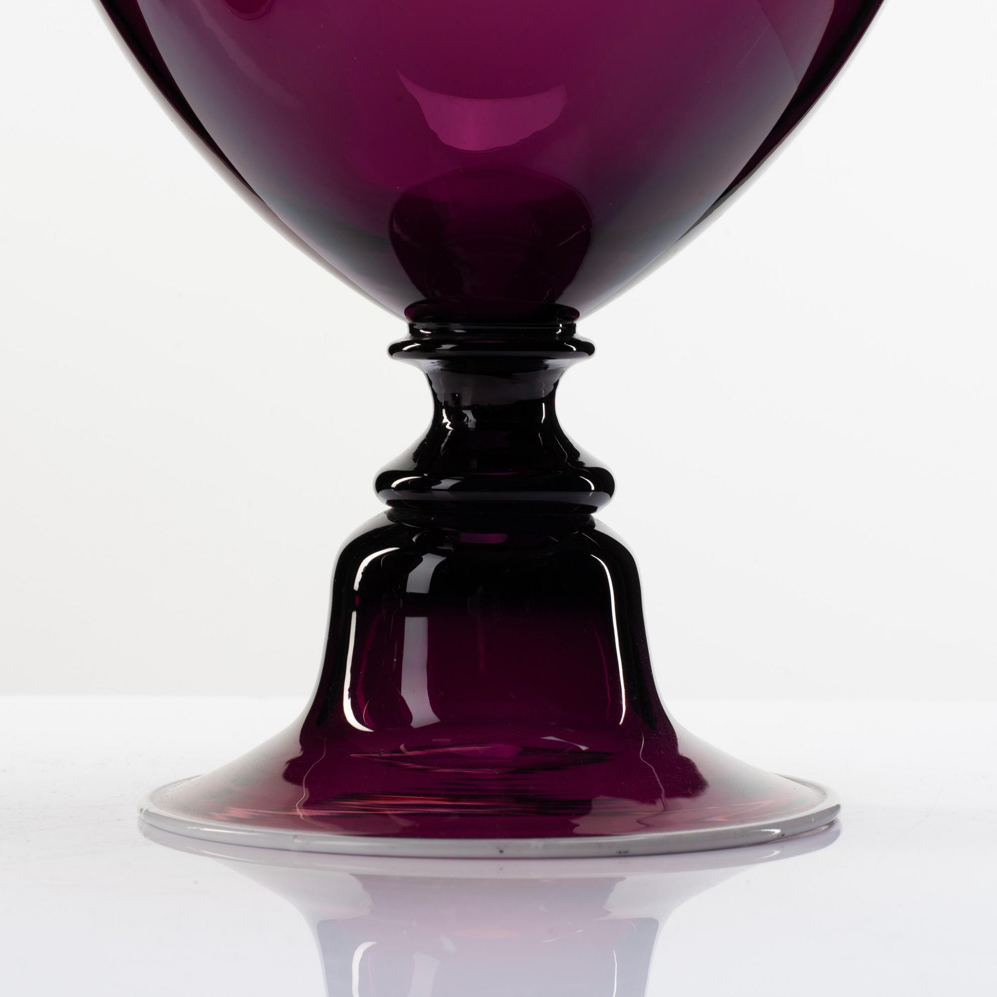 A pair of purple glass jars with covers, presumably Norway, 19th Century.