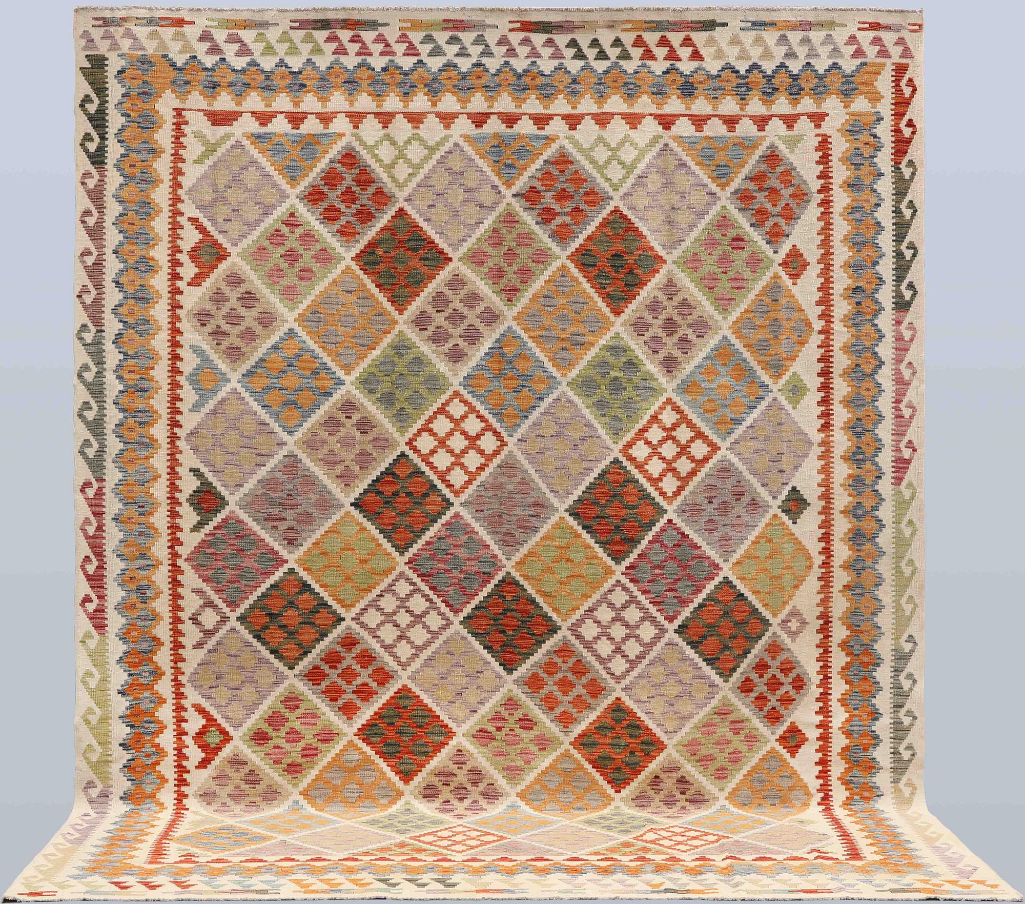 A Kelim carpet, c. 342 x 270 cm.