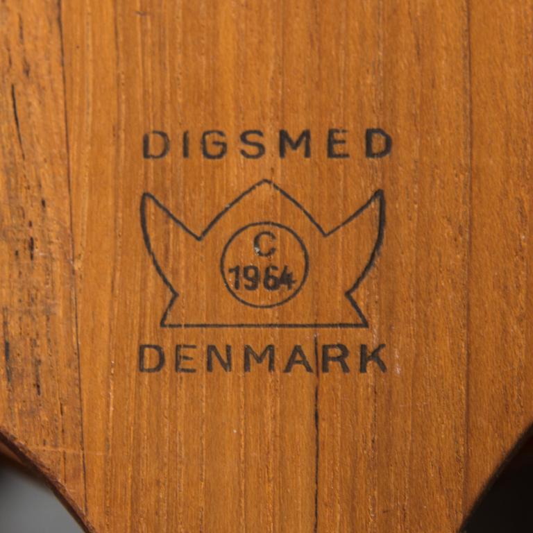 A Danish 1960s wall mounted spice rack in teak and glass from Digsmed.