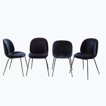 A set of four Beetle dining chairs by Gamfratesi for Gubi 2013.