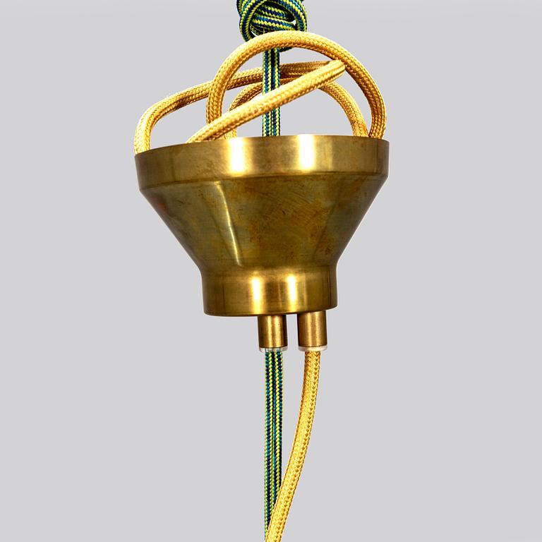 A contemporary 'Hobo' brass and glass pendant lamp by Gustaf Nordenskiöld for Örsjö.
