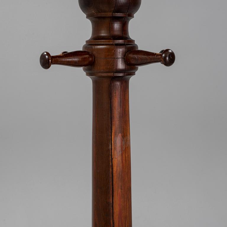 A stained pine clothes hanger, first half of the 20th century.