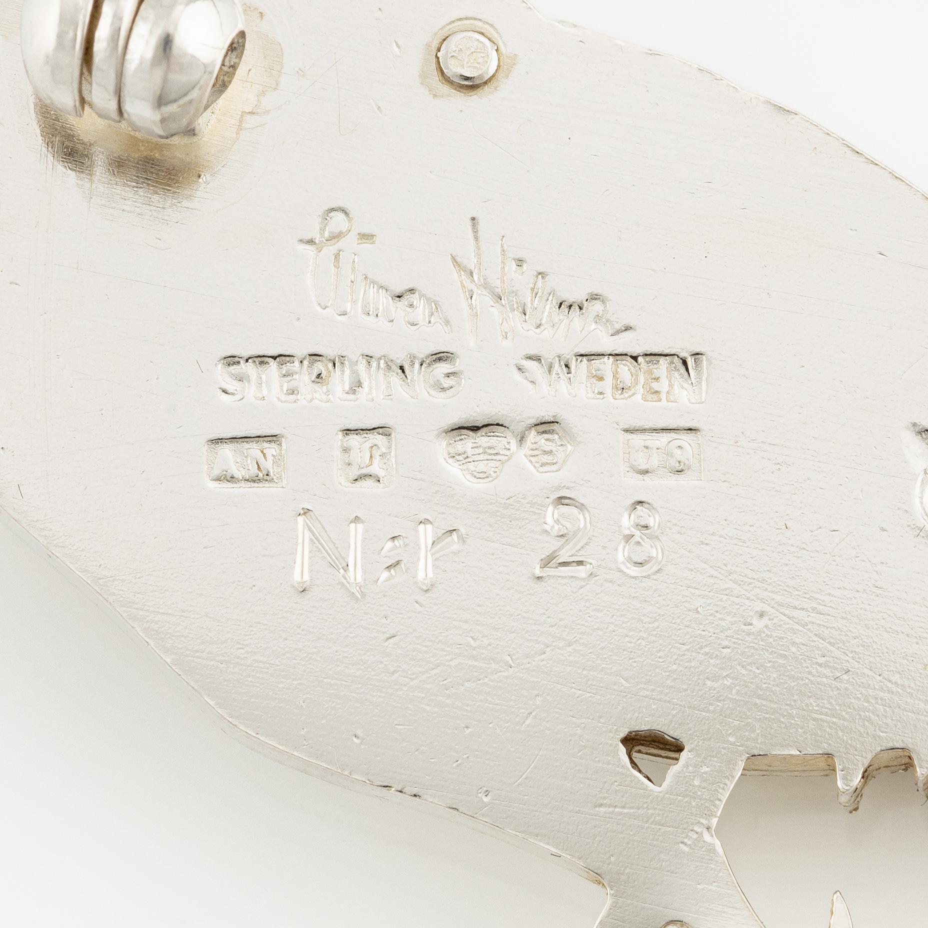 Wiwen Nilsson, brosch, sterlingsilver, i form av tupp, Lund 1970.