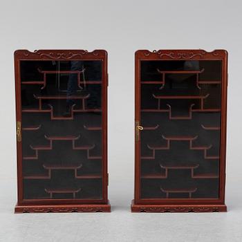 A pair of chinese wall cabinets, 20th century.