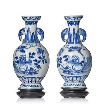 961. A pair of blue and white 'peony and birds' vases, Qing dynasty, Guangxu mark and period (1875-1908).