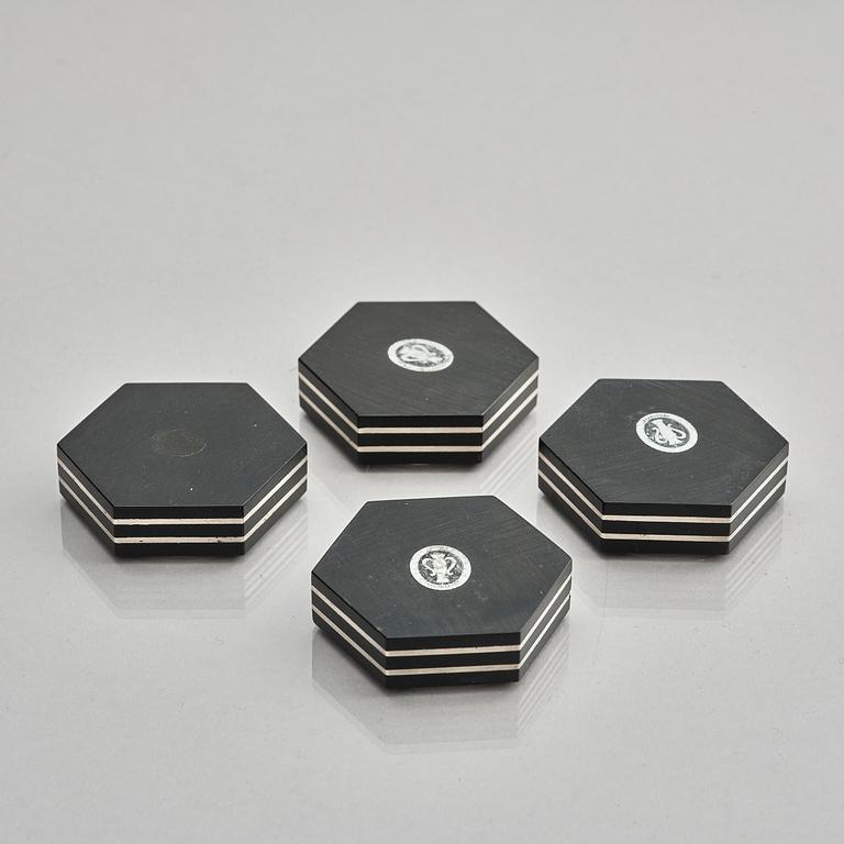 Guldsmedsaktiebolaget (GAB), four silver and bakelite salt-cellars, design by Eric Pihlgren, Stockholm, Sweden 1938.