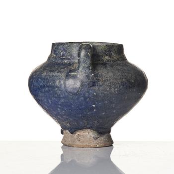 A blue-glazed Nishapur pottery Jug, Persia, 13th century.