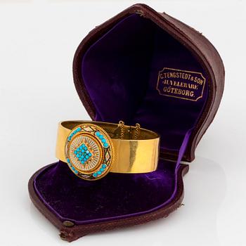 Armband 18K guld med turkos och emaljdekor.