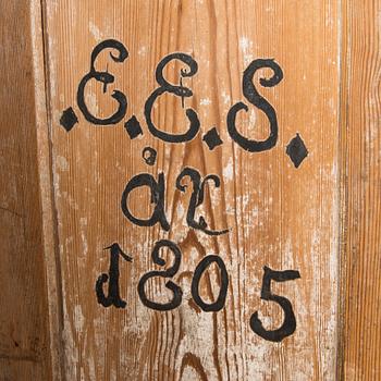 Skåp daterad, märkt EES ÅT daterad 1805.