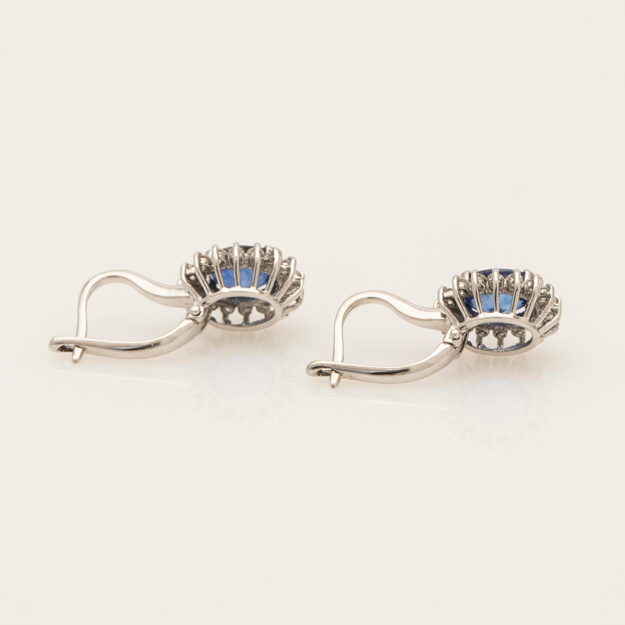 Earrings, a pair, 18K white gold with sapphires and diamonds.