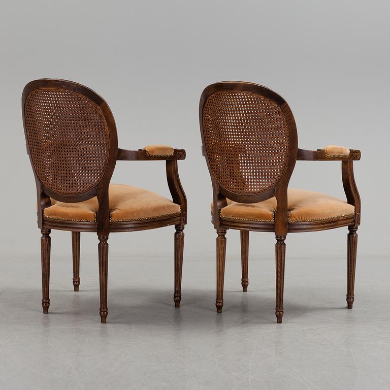 A pair of Gustavian style armchairs, second half of the 20th Century.