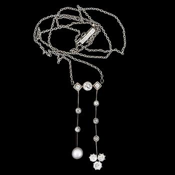 COLLIER, 14k guld och silver, gammalslipade diamanter tot ca0,65ct samt pärla Ø ca5.4mm. Ca 1915.