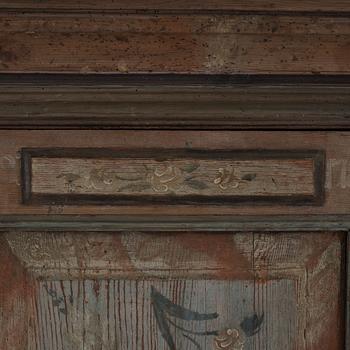 a painted cabinet, partly 18th century.