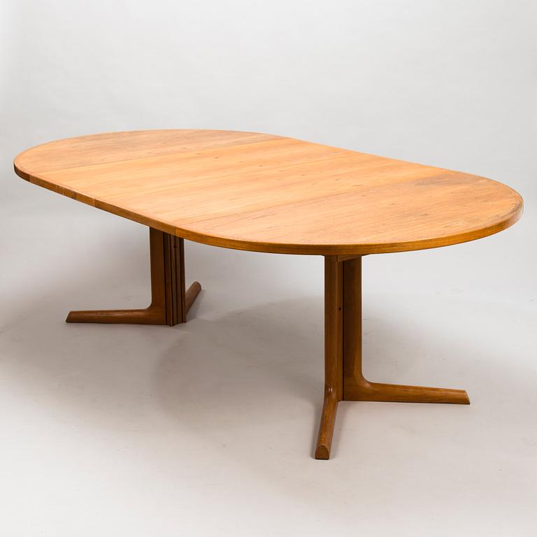 NIELS OLE MØLLER, A mid-20th-century extending dining table for Gudme Möbelfabrik, Denmark.