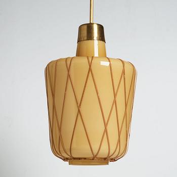 A pair of Swedish Modern vanilla coloured glass ceiling lights with fretted rattan, 1930-40's.