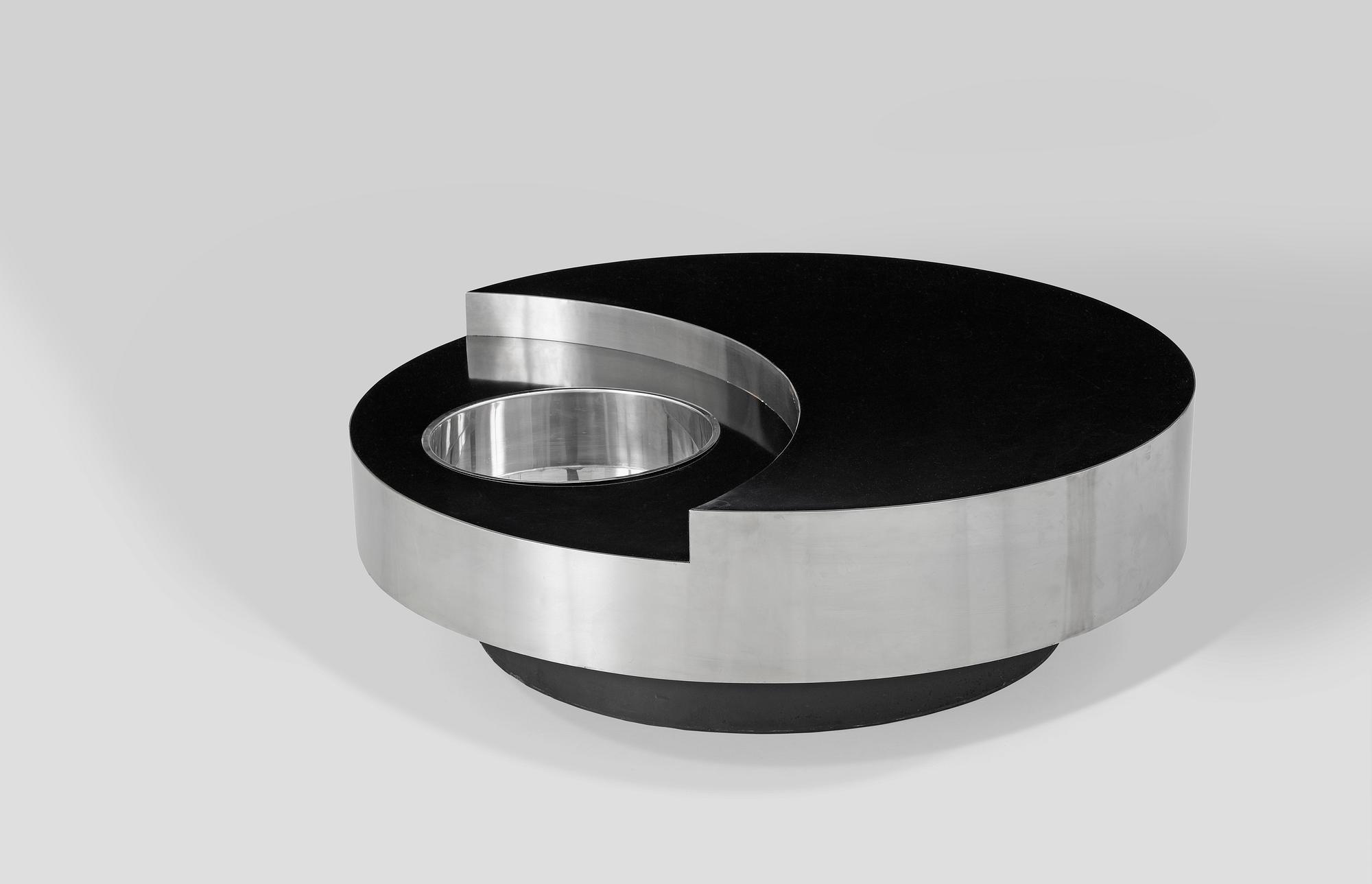 A Willy Rizzo revolving coffee table with bar, France, 1970s.