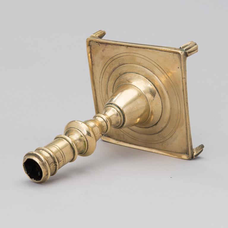 A brass candlestick from the end of the 17th century.