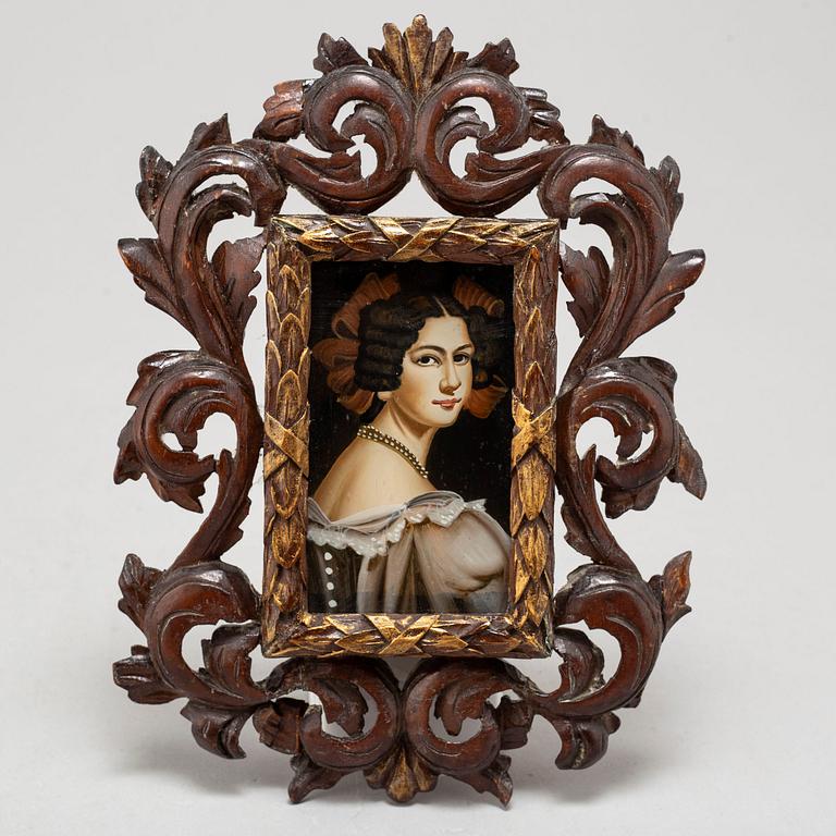 A 19TH CENTURY GLASS PAINTING.