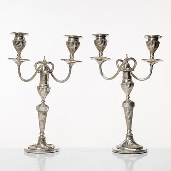 A pair of English silver candelabra, mark of Hawksworth, Eyre & Co Ltd, Sheffield 1892.