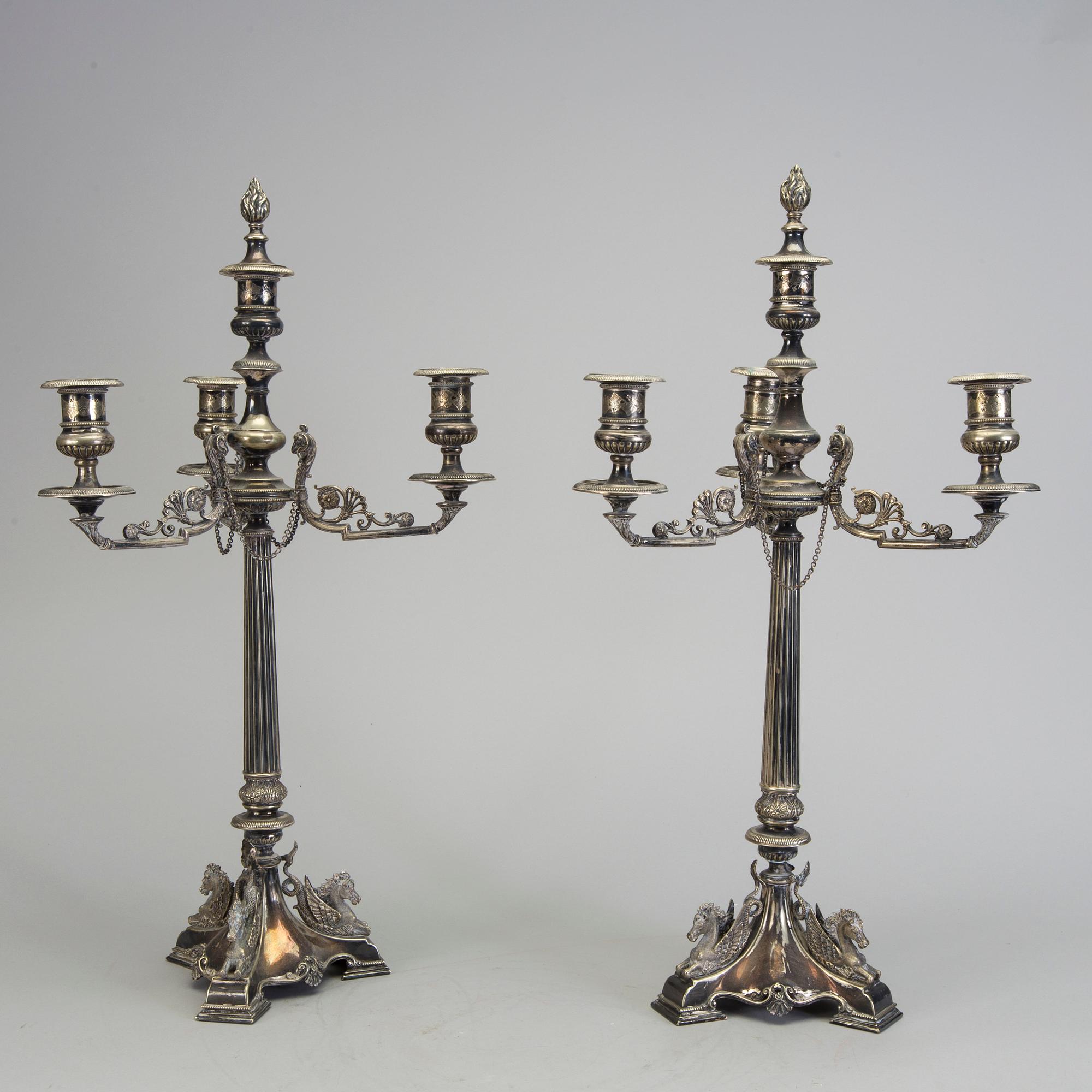 A pair of late 19th century silver plated kandelabras by Henry Wilkinson & Co Ltd, Sheffield, England.