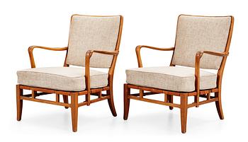 489. A pair of Carl-Axel Acking easy chairs by NK circa 1946.