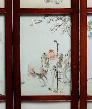 A Chinese folding screen with 48 porcelain tiles, late Qing dynasty, signed Ren Huanzhang, and dated 1881.
