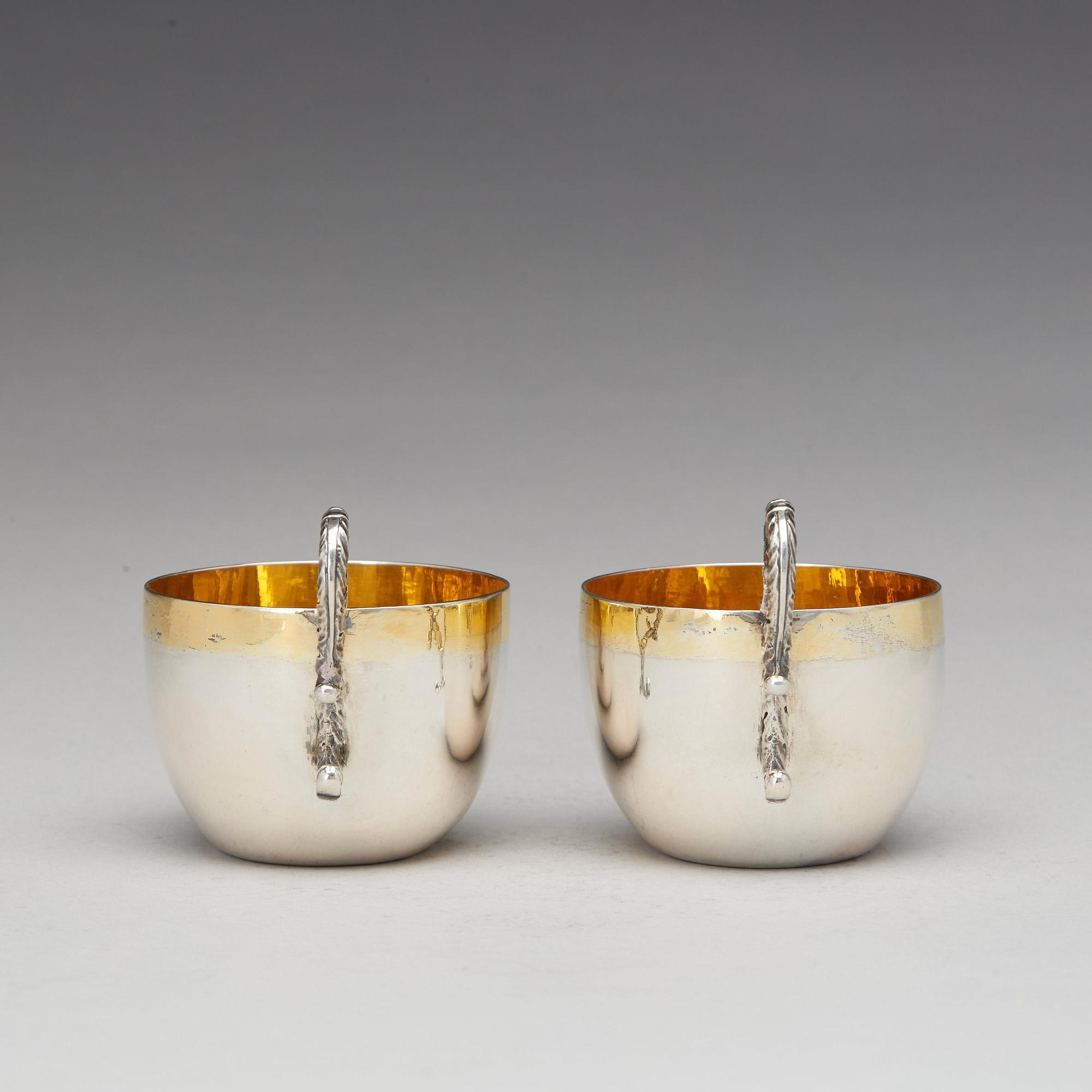 A pair of Swedish parcel-gilt silver cups, mark of Daniel Falck, Malmo (1685-1705). Reworked in the 19th century.
