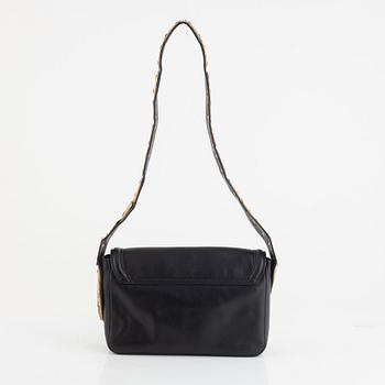 Valentino Red, A black leather snake bag.