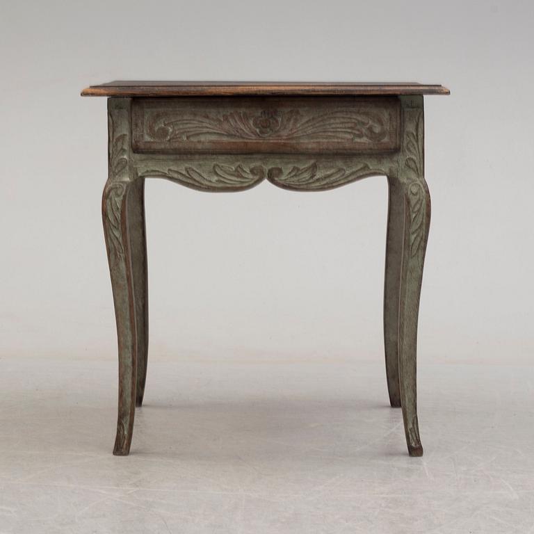 A french rococo-style table, 19th century.