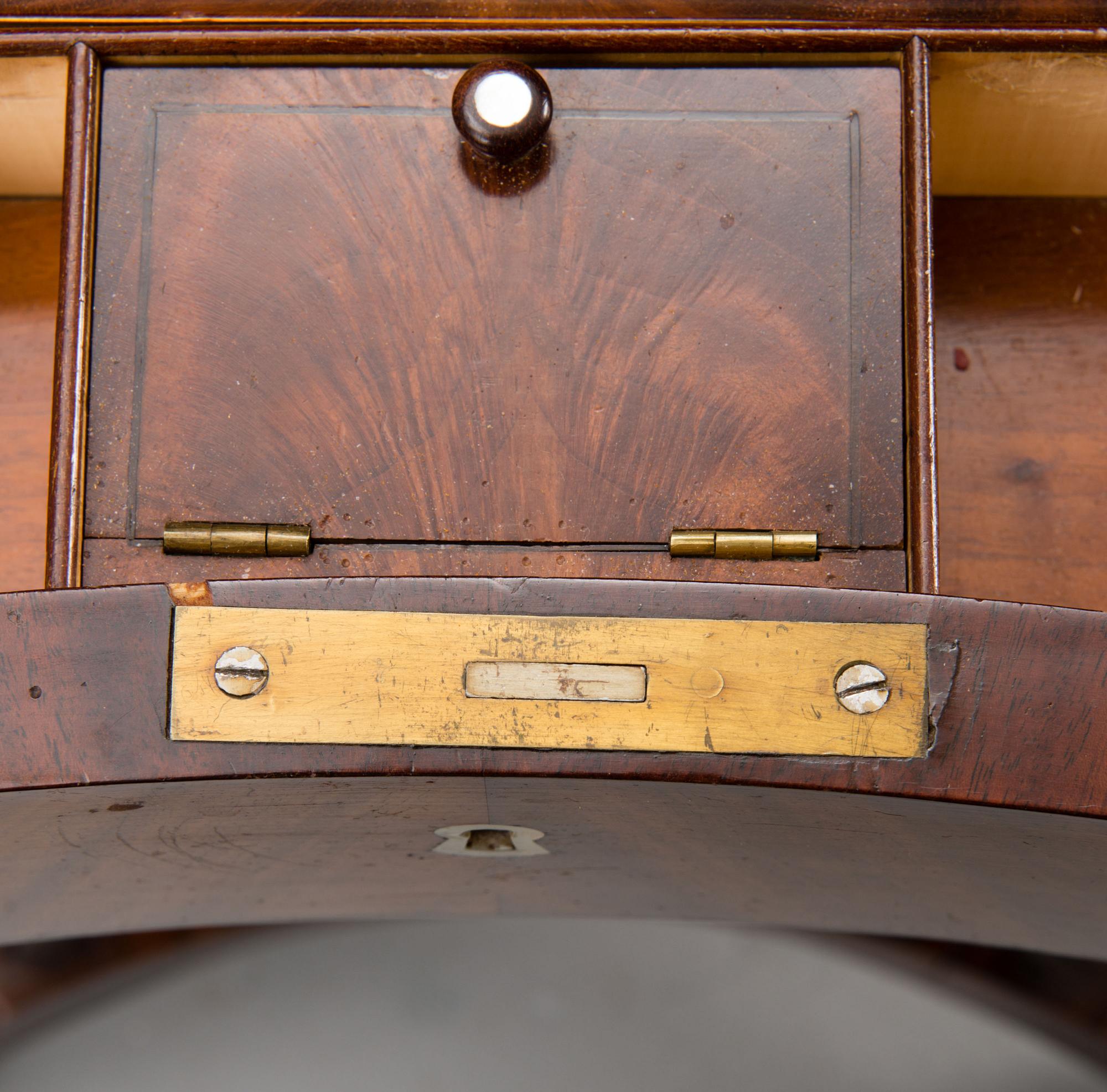 A sewing table from the first half of the 19th century.