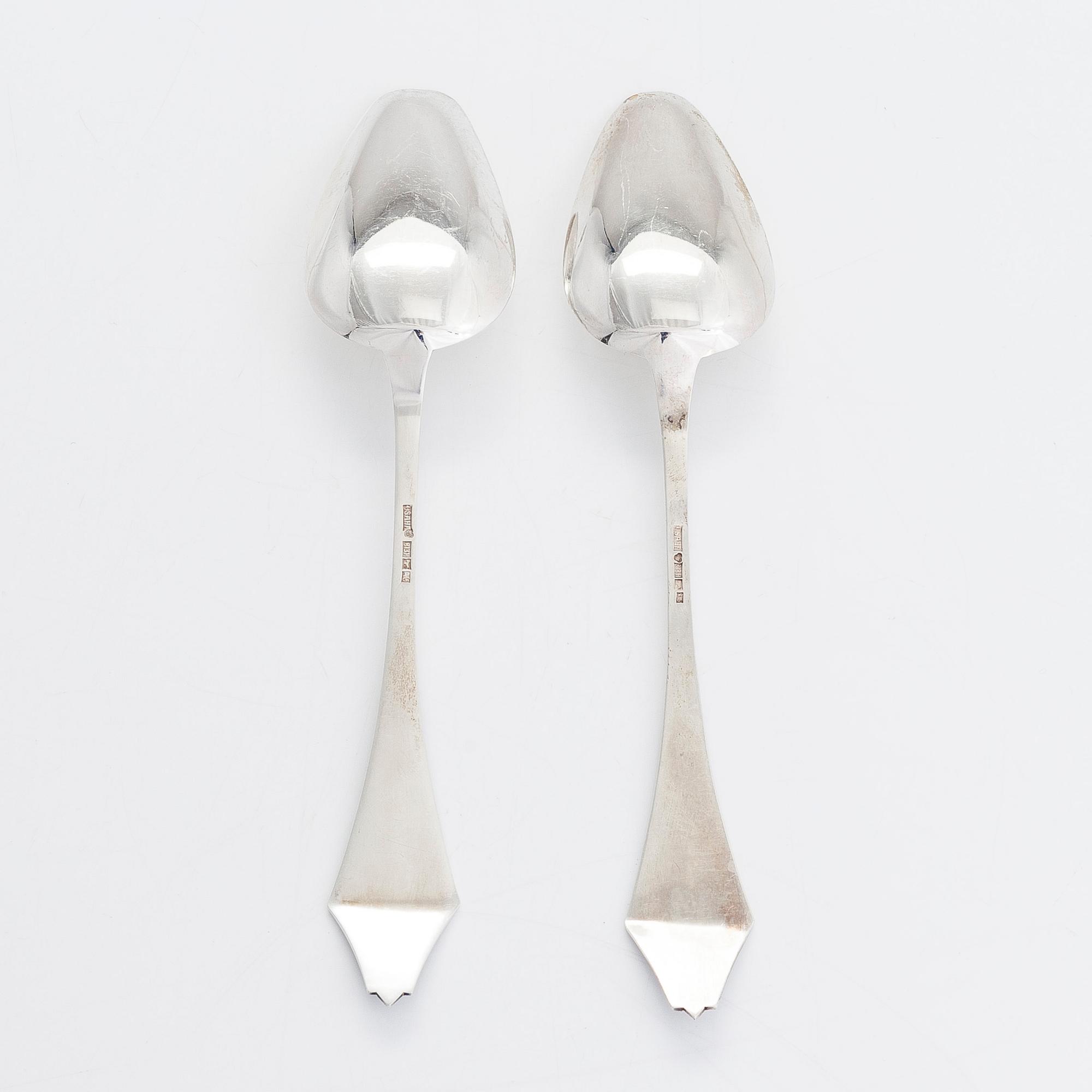 Ilmari Saha, a 12-piece set of silver table spoons in original boxes, Pori, Finland 1927-31.