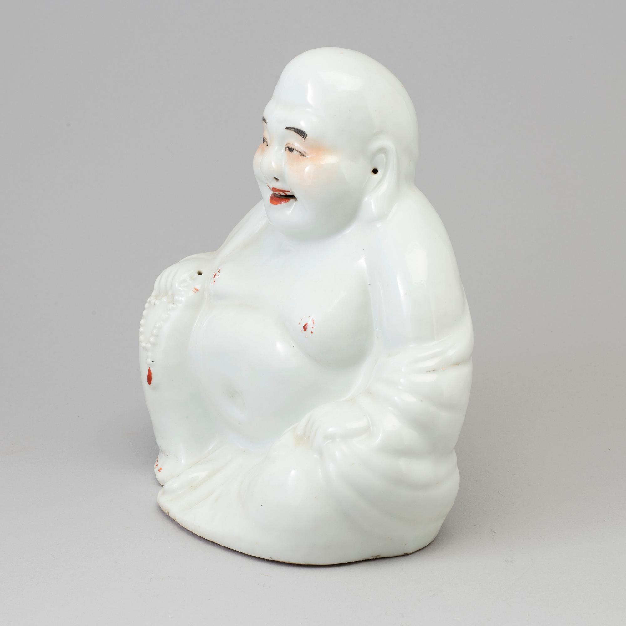 A Chinese porcelain Buddhai, 20th century.