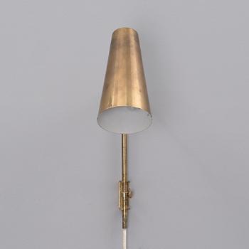 A 9459 wall light manufactured by Idman.