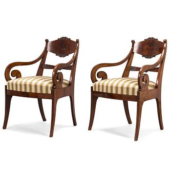 A pair of 1820-40's Russian open armchairs.