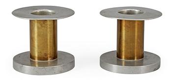 301. A pair of Bo Notini pewter and brass candlesticks, Svenskt Tenn 1932.