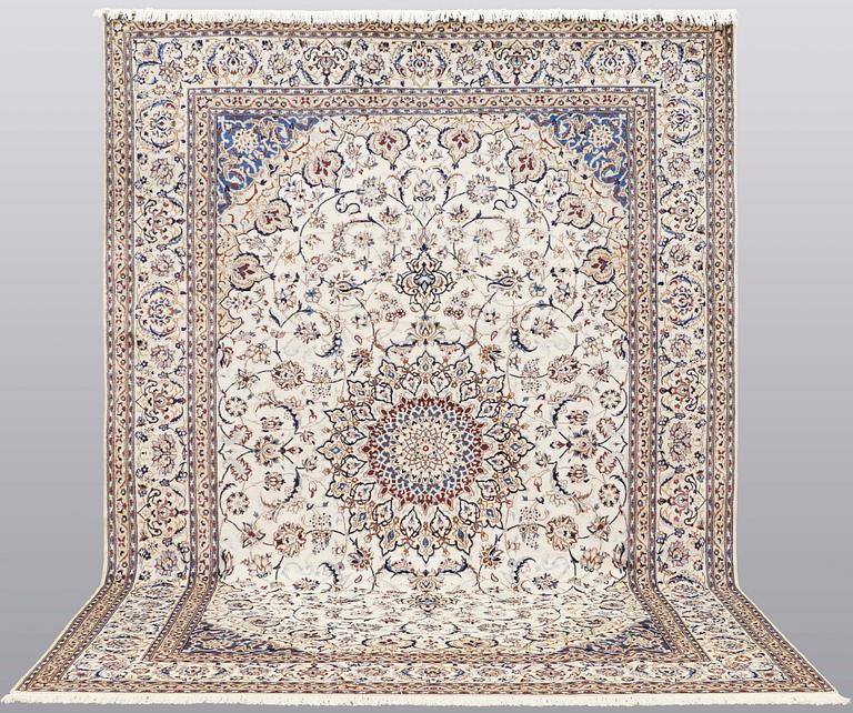 A carpet, Nain part silk, 361 x 262 cm.
