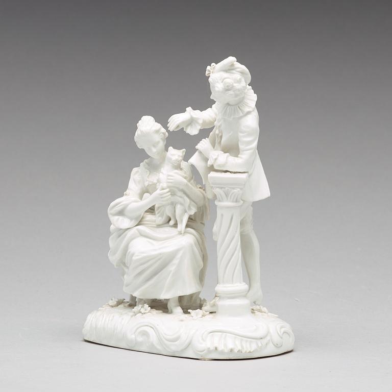 A white glazed porcelain figure of a courting couple with a cat, Frankenthal, 18th Century.