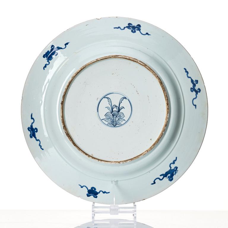 A massive blue and white 'peacock' charger, Qing dynasty, early 18th century.